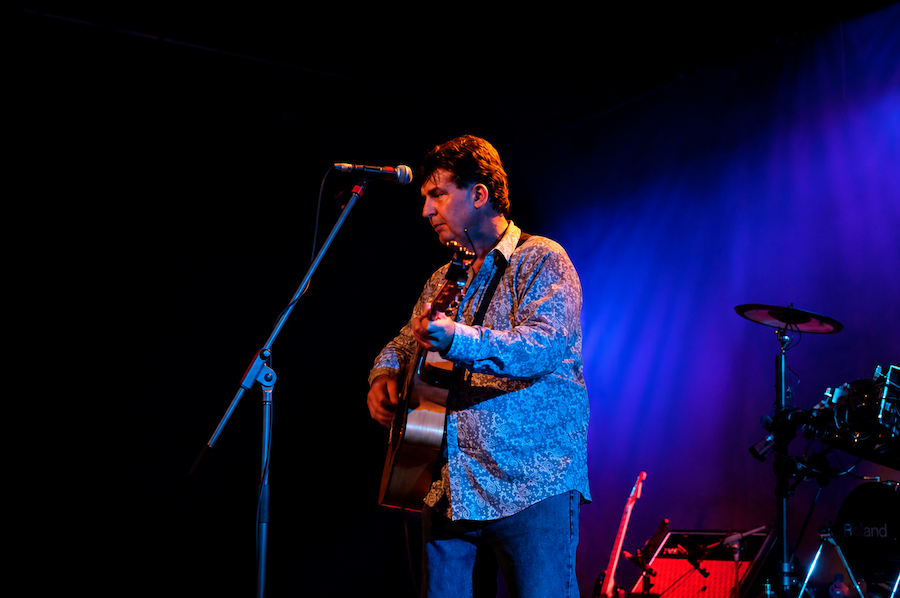 David Morgan holding guitar